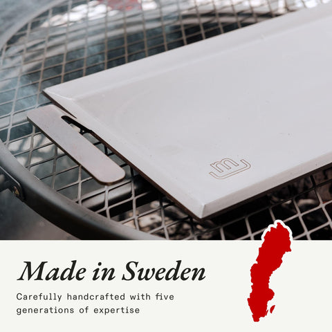 Made In carbon steel griddle seasoning process showing developing nonstick surface.