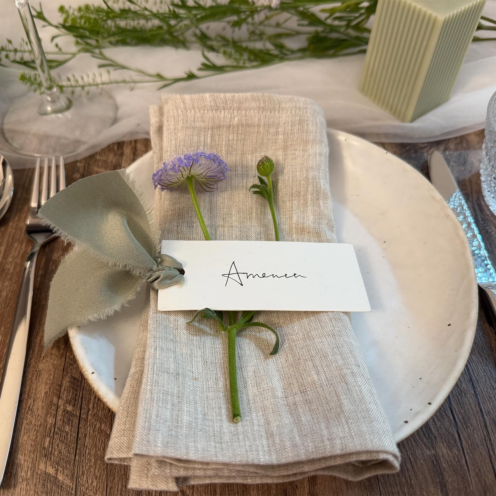Maegmew table name cards setup for a polished wedding reception