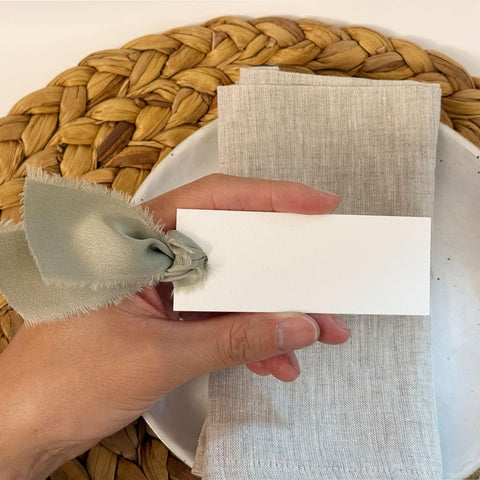 Dusty green Maegmew cards elevate dinner party decor and mood