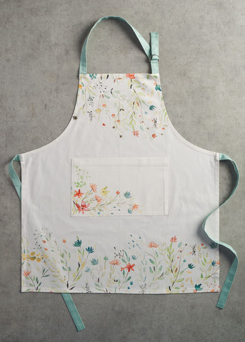 Maison d'Hermine gardening setup with apron and tools