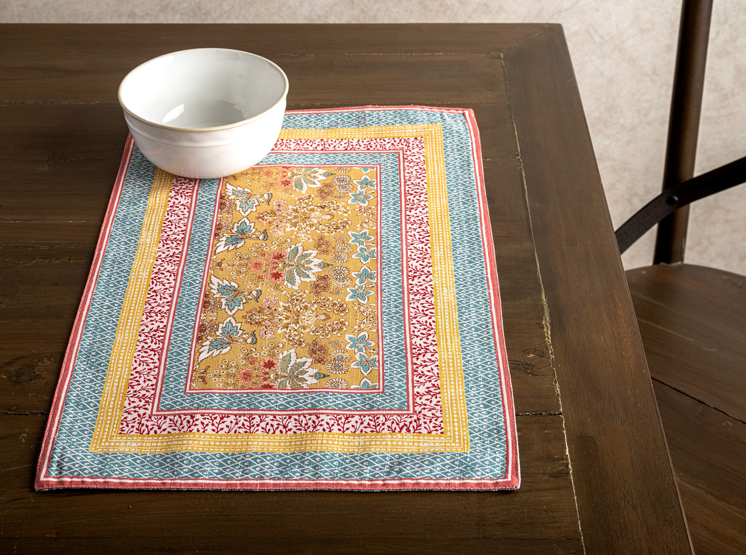 Hand-rendered watercolor motif on Maison d'Hermine placemat for refined tablescape.