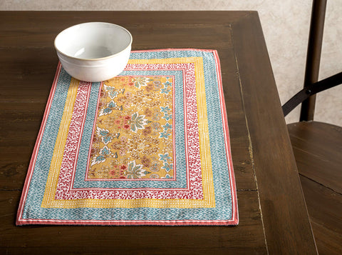Hand-rendered watercolor motif on Maison d'Hermine placemat for refined tablescape.