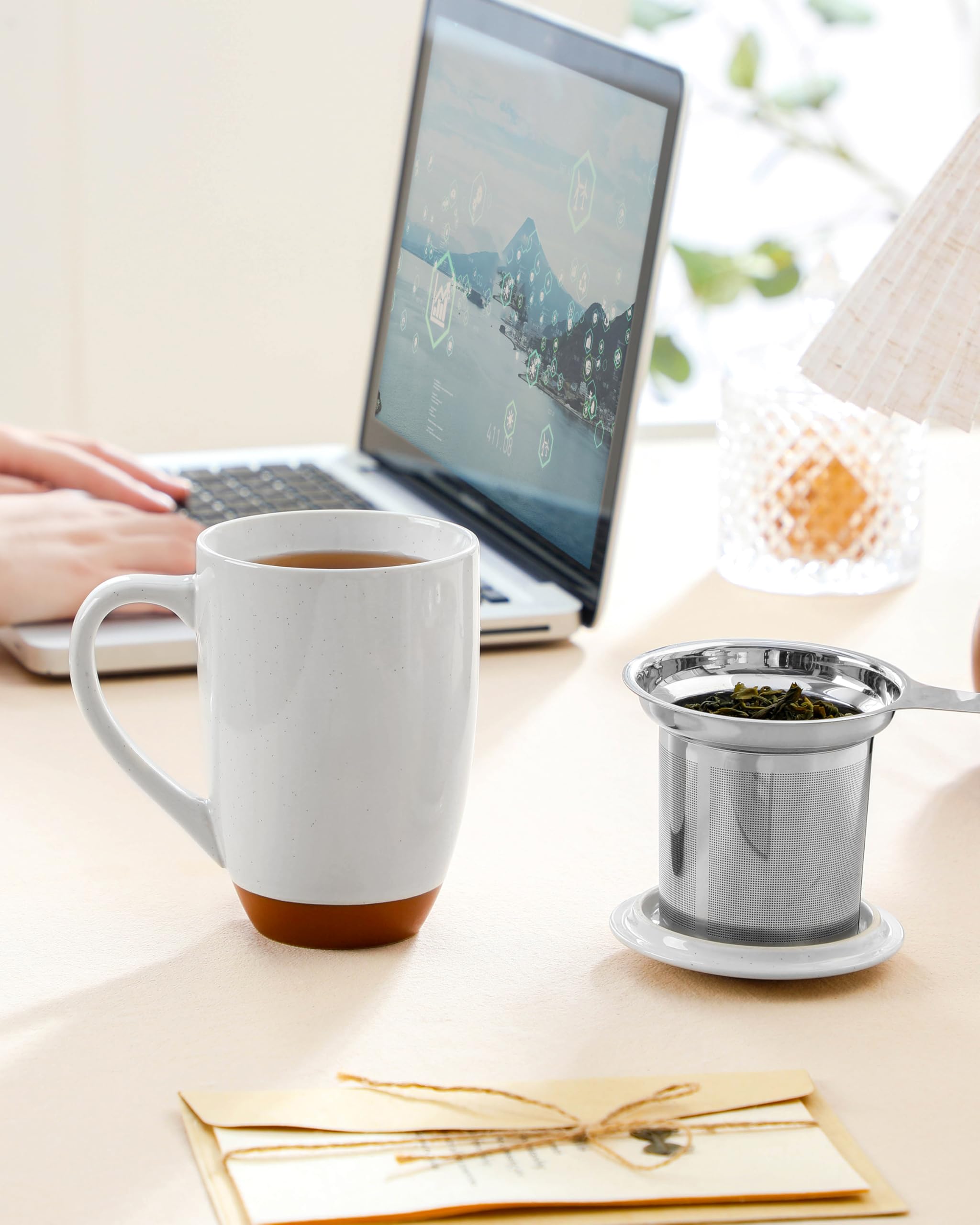 MALACASA ceramic mug features natural speckled glaze and sturdy base.