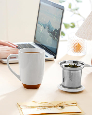 MALACASA ceramic mug features natural speckled glaze and sturdy base.