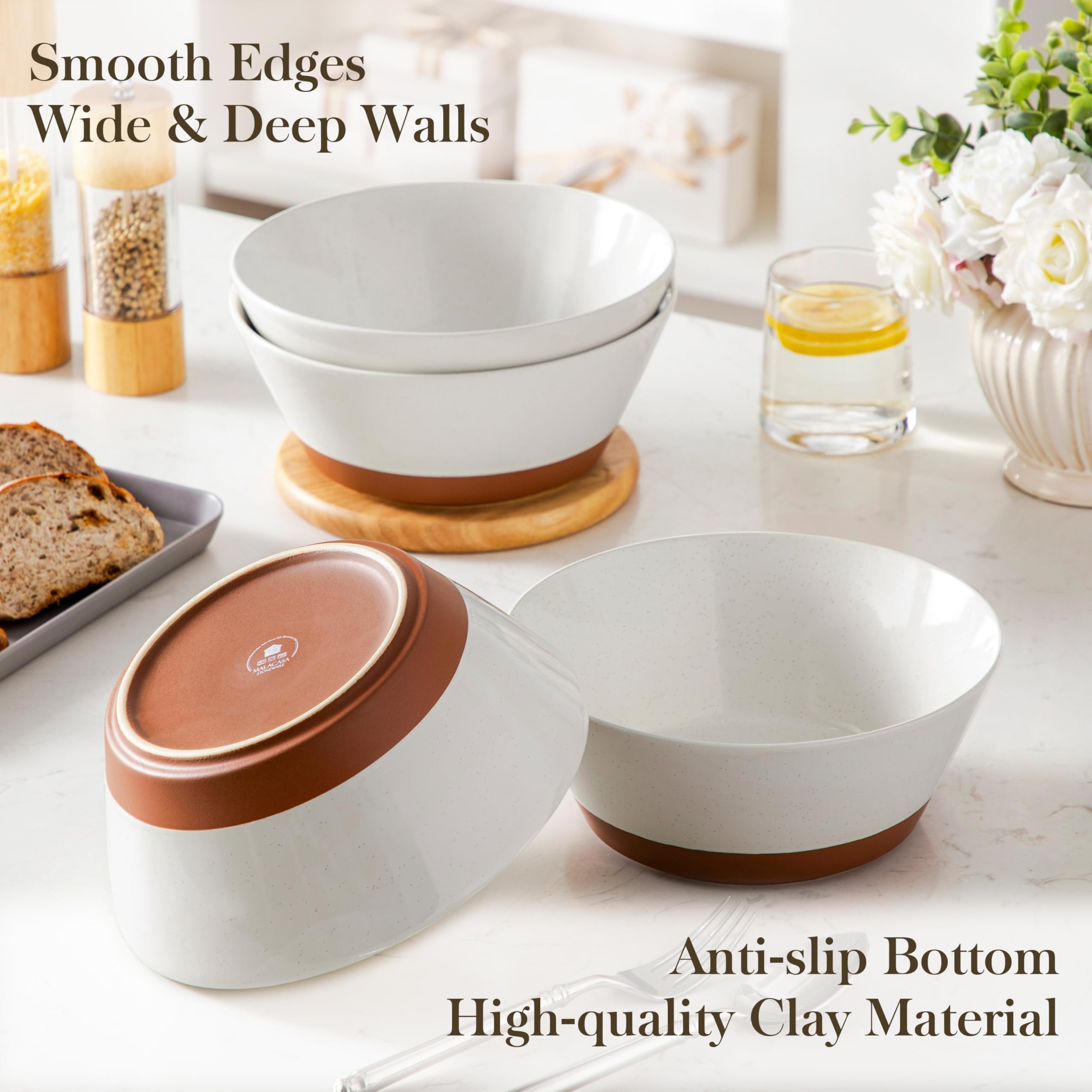 MALACASA ebony speckles accent the bowls with elegance
