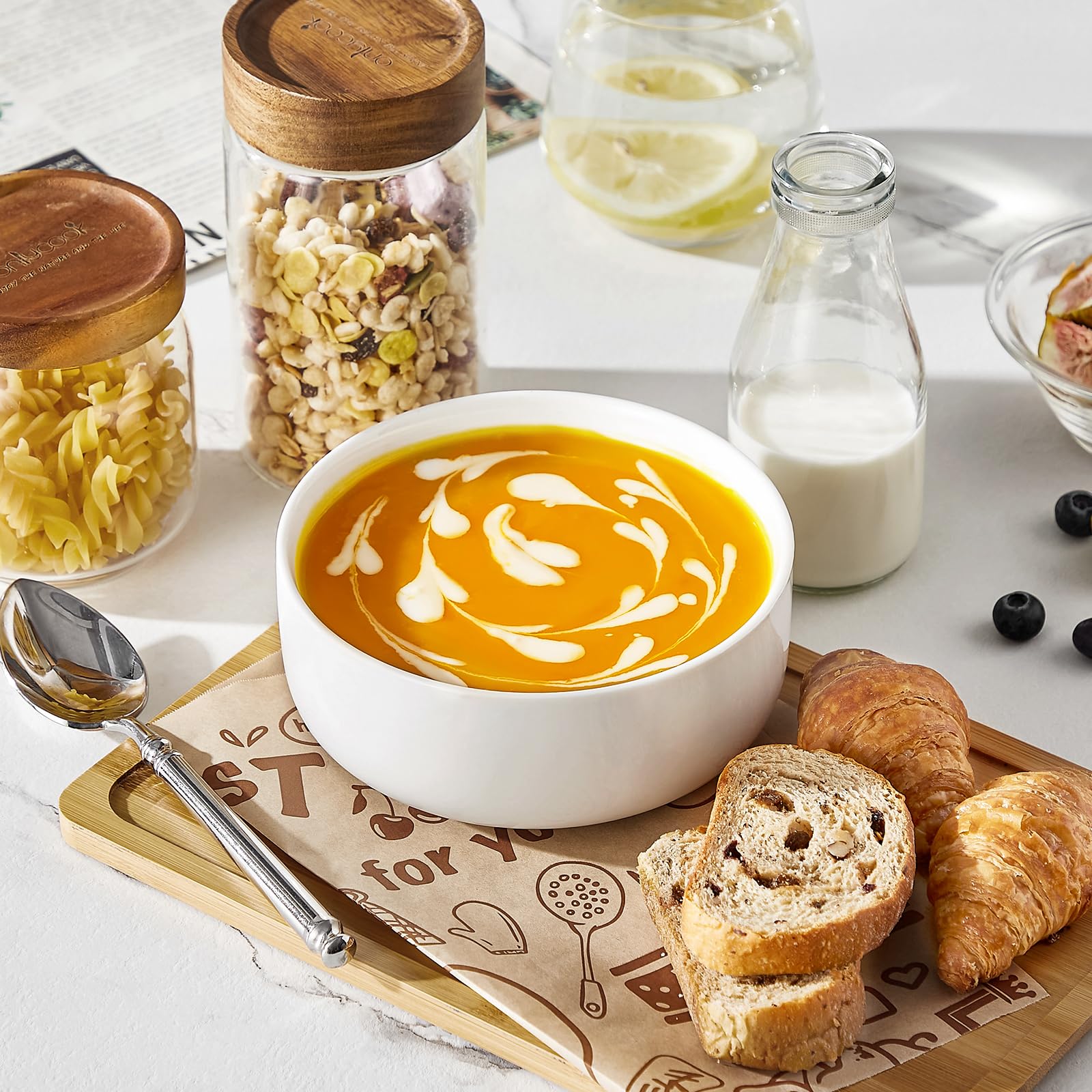 MALACASA LUNA bowls used in an oven-safe setting for warming servings.