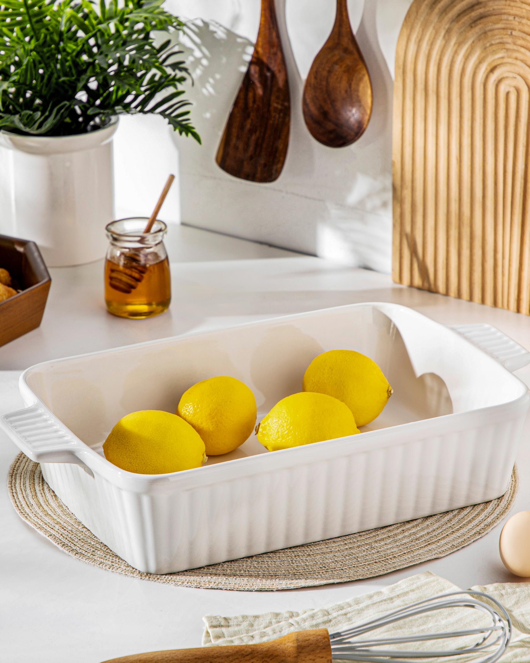 MALACASA white rectangular baking dish adds clean table presentation.