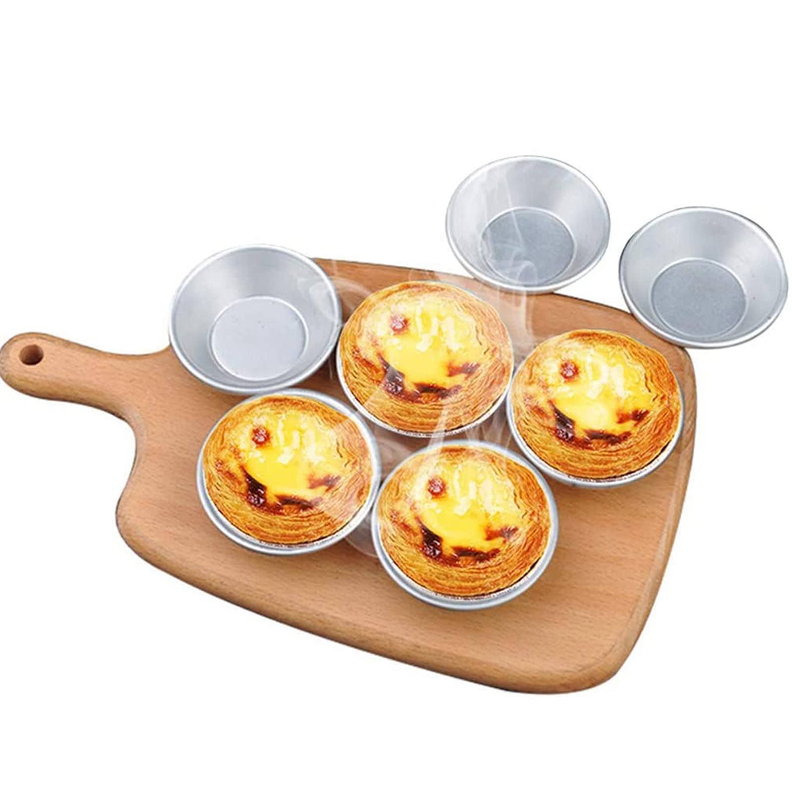 Manwetye mini tarts being prepared for even baking