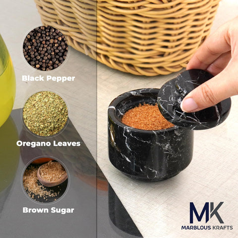 Compact marble dish doubles as storage for small items when not used for seasoning.