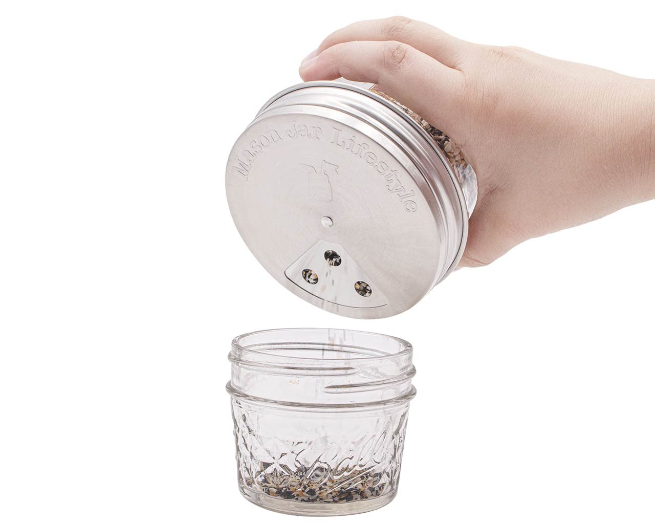 Mason Jar Lifestyle dishwasher-safe lid keeps spices organized and rust-free.