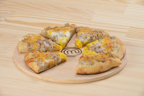 MasterChef Junior plastic pizza cutter with kid-safe non-slip grip.