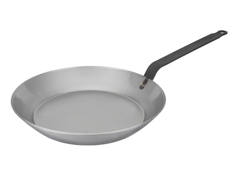Matfer Bourgeat black carbon steel pan, front view, durable surface for quick searing.