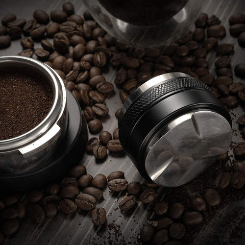 MATOW double-sided tamper close-up demonstrates dual-head functionality.