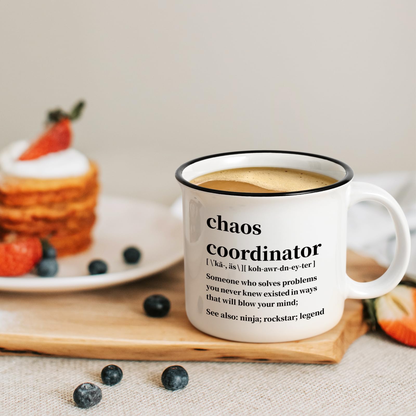 Maustic Chaos Coordinator Mug held in hand during break.
