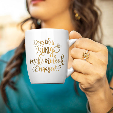 Maustic funny mug featuring 'Does This Ring Make Me Look Engaged?' for mornings.