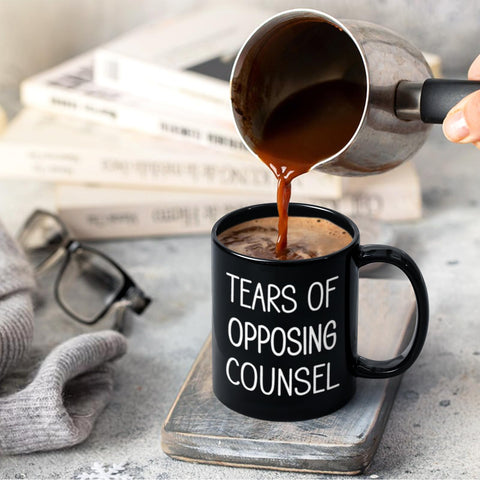 Maustic Tears of Opposing Counsel mug anti-slip base for stable placement on desk.