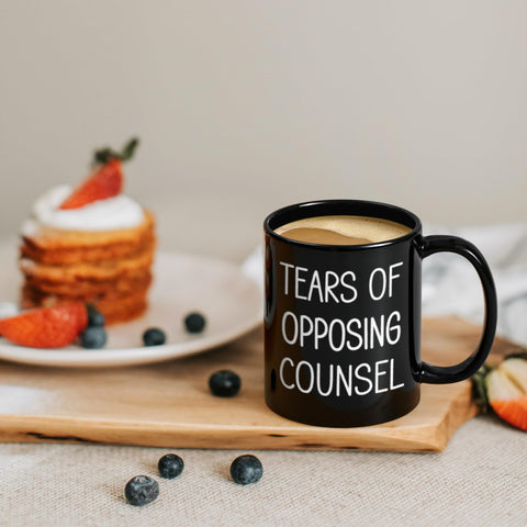 Maustic Tears of Opposing Counsel mug shows double-sided print for visibility.