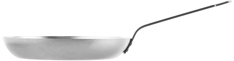 Mauviel M'Steel pan showing browning capabilities on a hot surface.