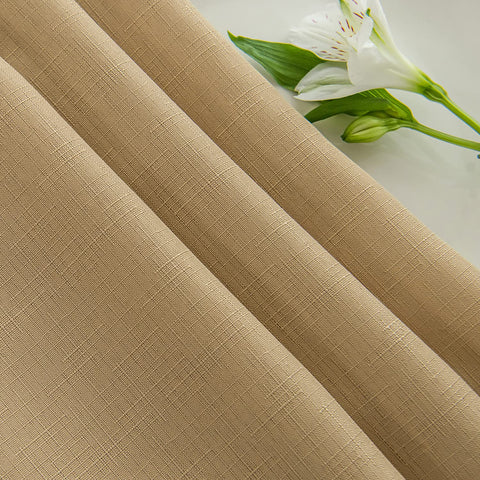Patio dining setup featuring a Maxmill beige faux linen tablecloth.