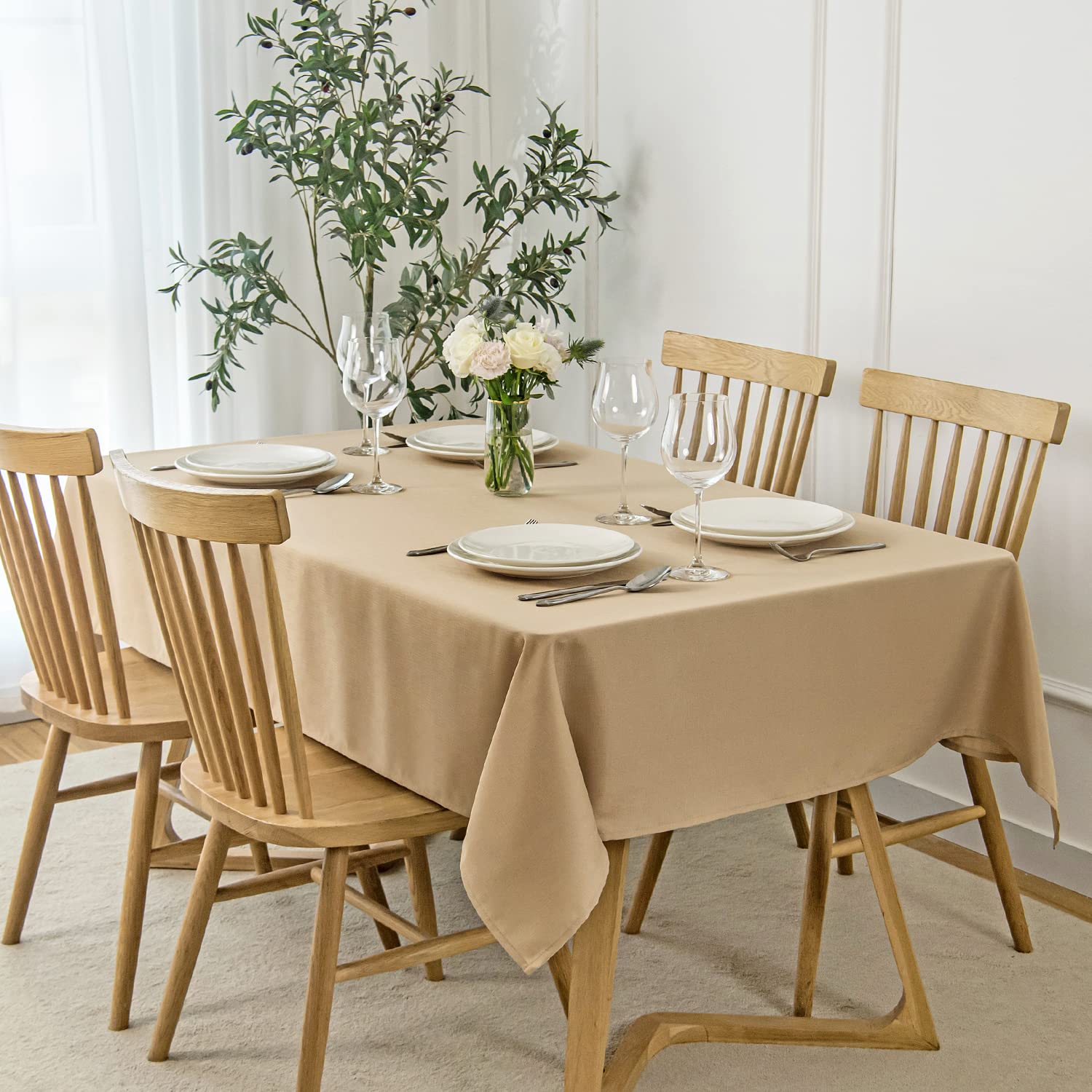 Maxmill beige faux linen tablecloth for refined dining room settings.