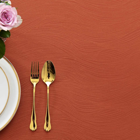 Maxmill Jacquard Swirl Rust tablecloth with water beads for spill resistance