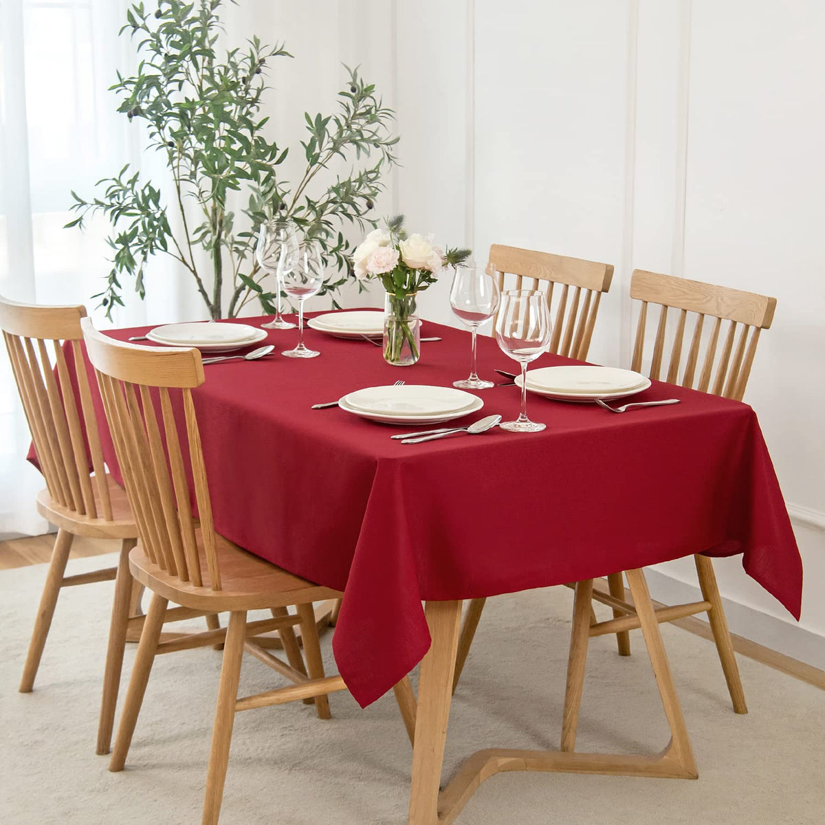 maxmill rectangle slubby textured tablecloth red close-up shows rich weave for festive dining.