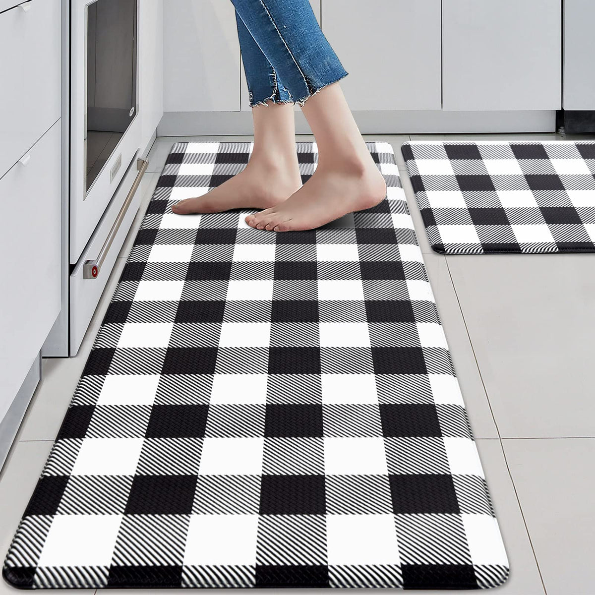 MAYHMYO anti-fatigue rug kitchen mat 2-pack provides cushioned comfort during long cooking sessions.