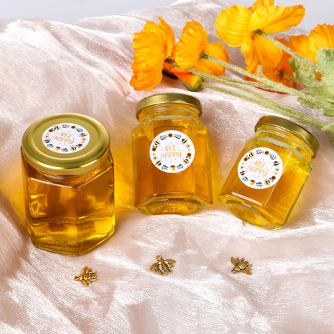 Mcupper hexagon glass jar with golden lid close-up showing airtight seal.