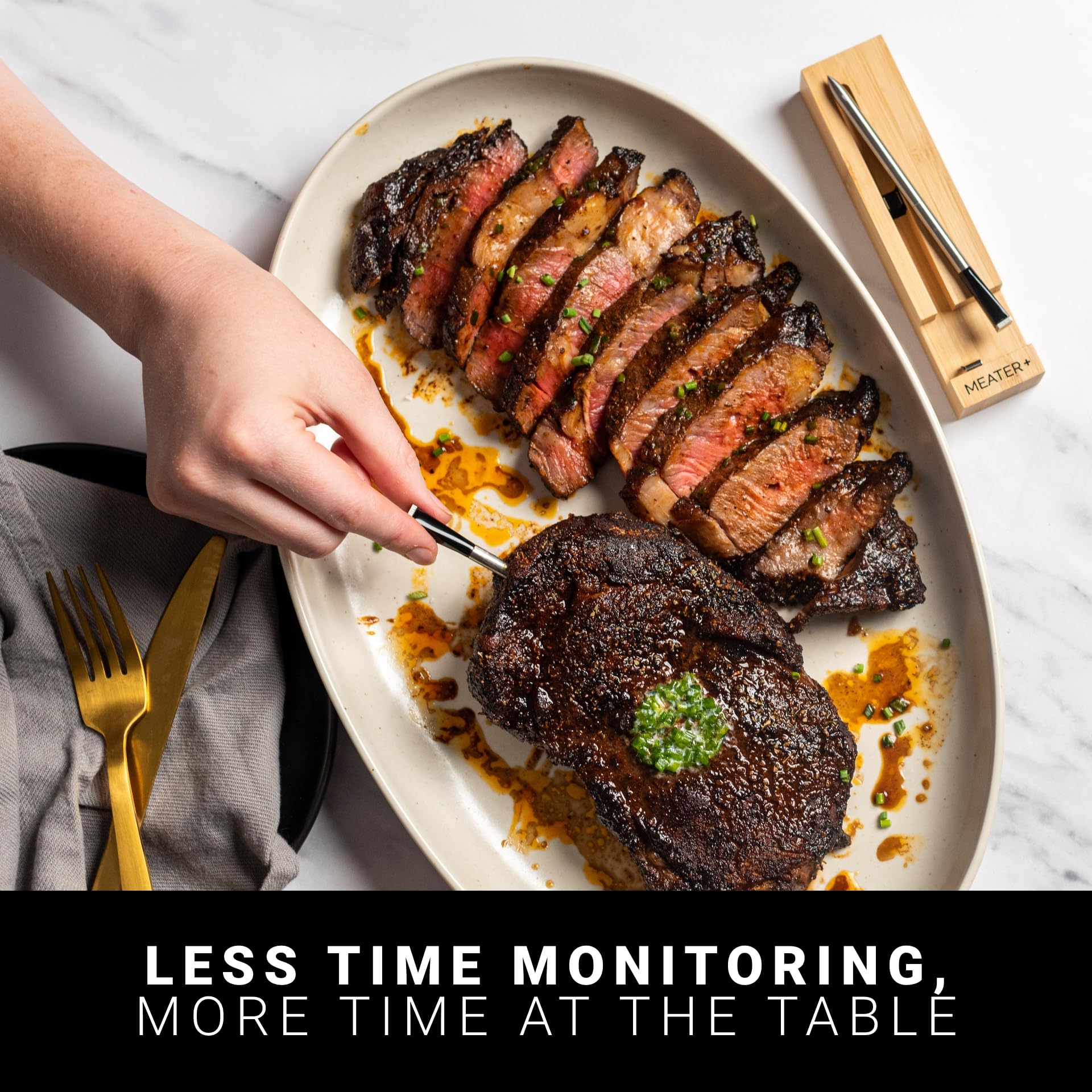 MEATER Plus charging cradle with repeater extending Bluetooth range across kitchen