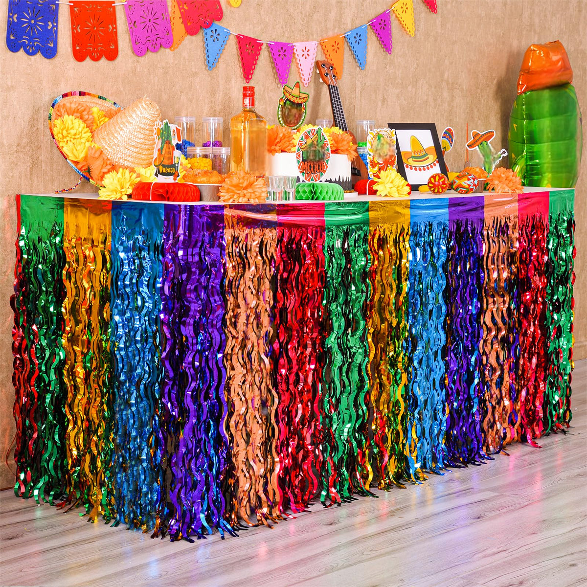 Mega-L Fiesta table skirt in red-green-yellow-blue-orange with wavy design adds vibrant party flair
