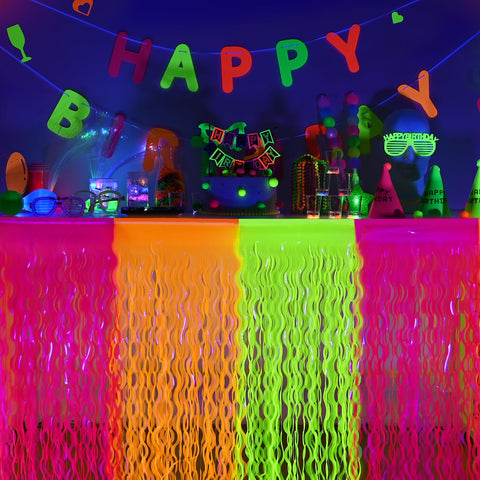 Mega-L Glow neon table skirt in yellow glows softly for festive dessert table ambiance.