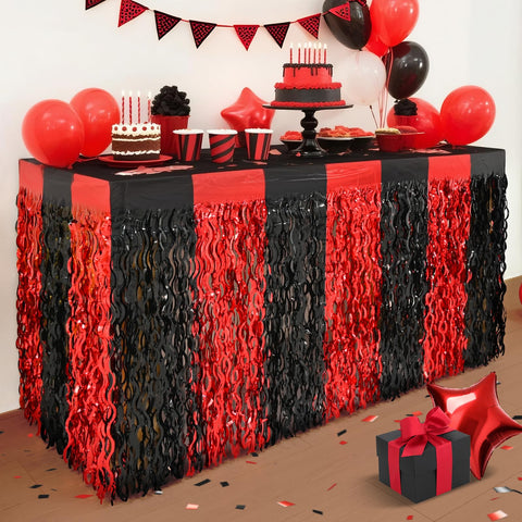 Mega-Loopolis red-black foil fringe table skirt brightens graduation tables for photos.