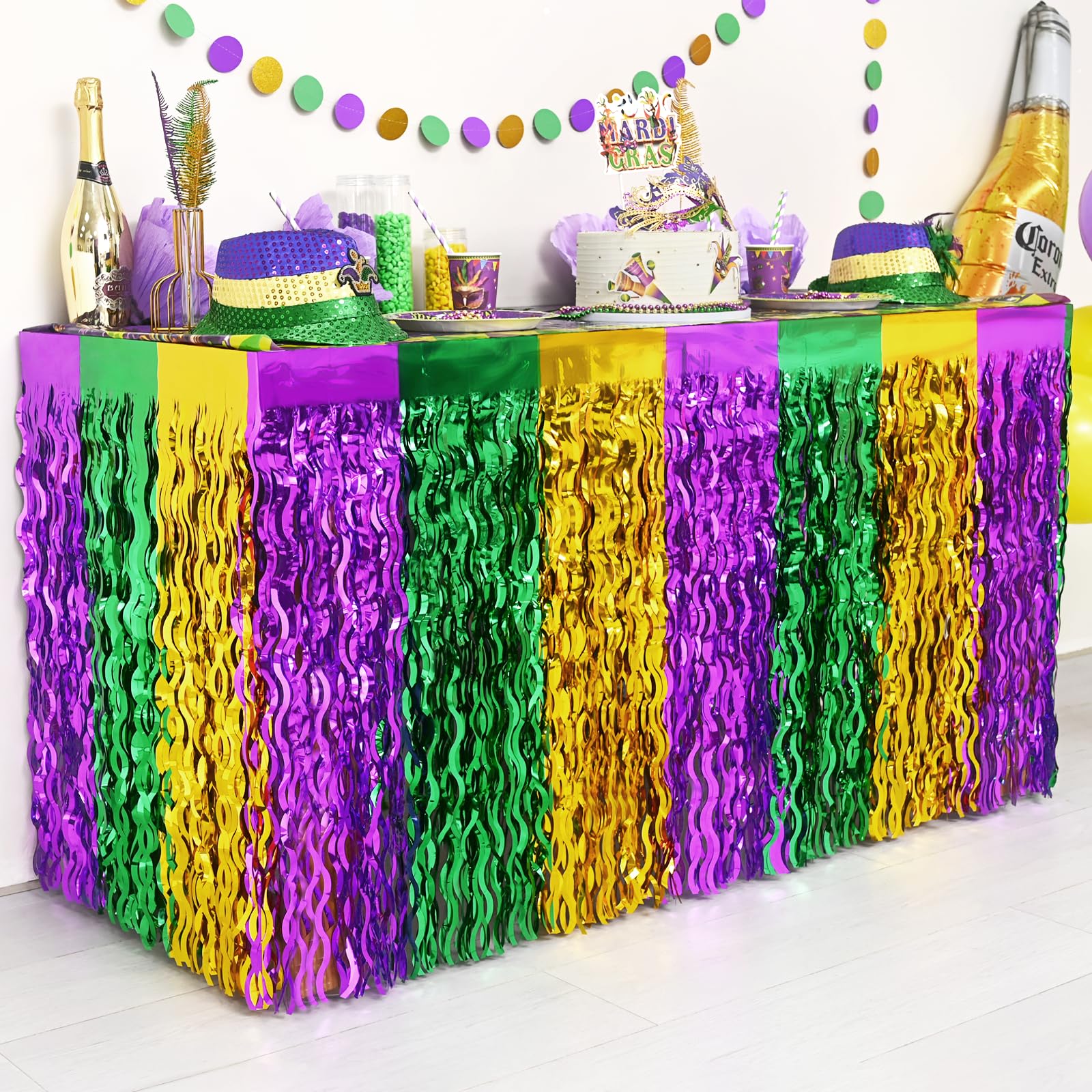 Mega-Loopolis Mardi Gras foil fringe table skirt adds sparkling centerpiece for rectangular or round tables.