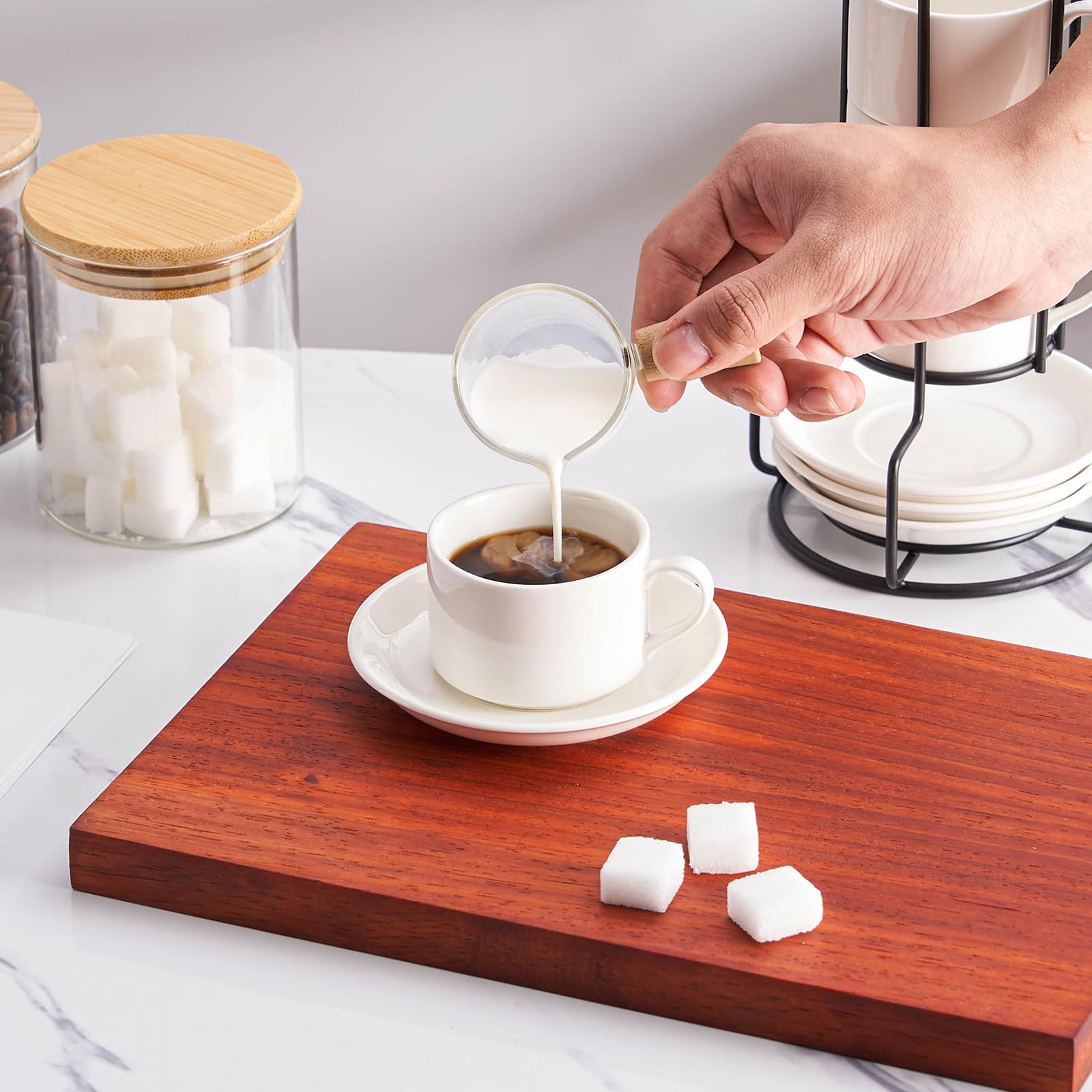 Meichu metal stacking stand keeps the set compact and accessible.