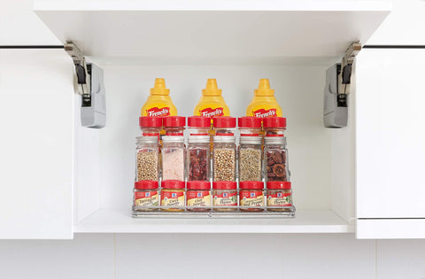 MEIQIHOME 4-tier rack demonstrates easy accessibility for jars and bottles during cooking.