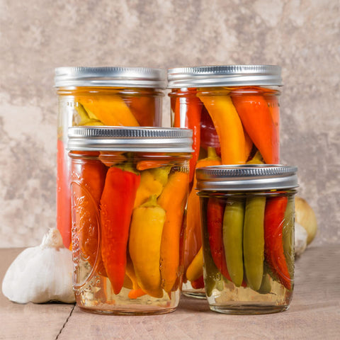 Clear Melcars glass jar showing colorful contents inside