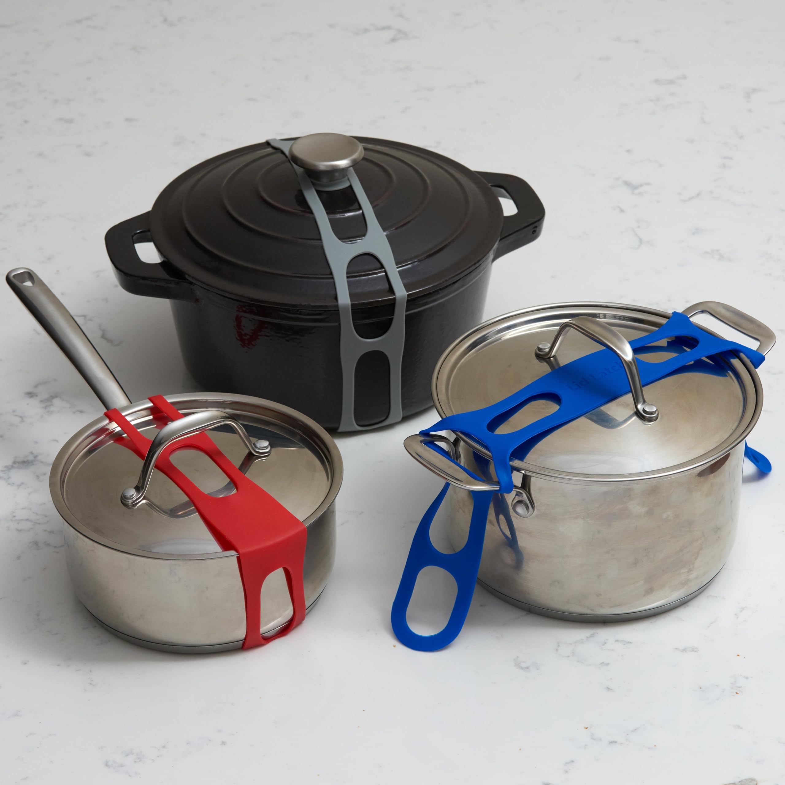 Mella Lid Latch clamps around a casserole lid for easy transport