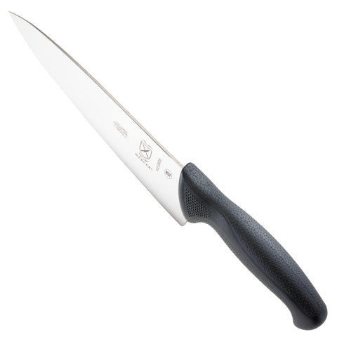 Mercer Culinary Millennia knife on cutting board ready for dicing and mincing.
