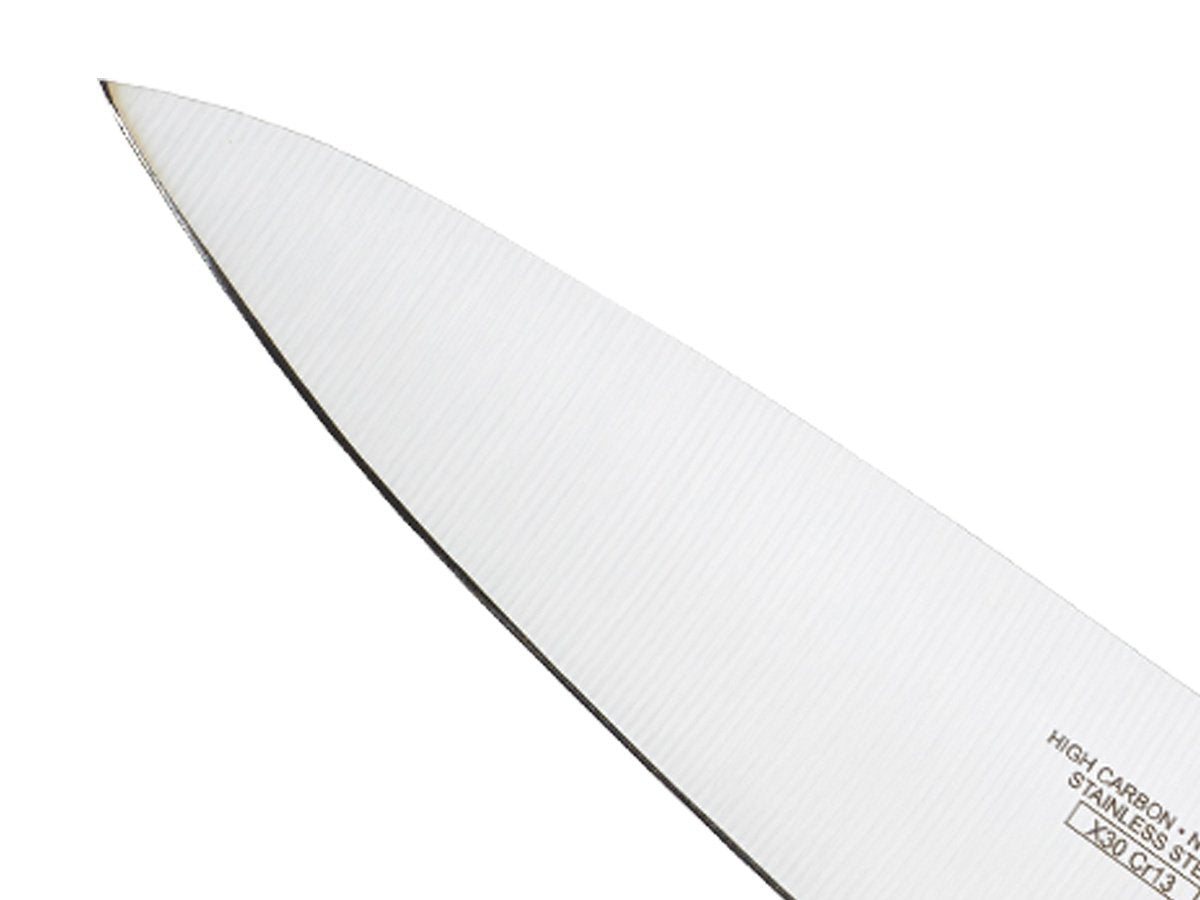 Mercer Culinary Millennia knife chopping onions with ease for even slices