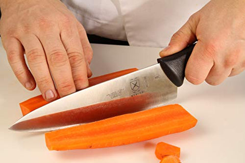 Mercer Culinary Millennia knife in a bustling pro kitchen for daily prep.
