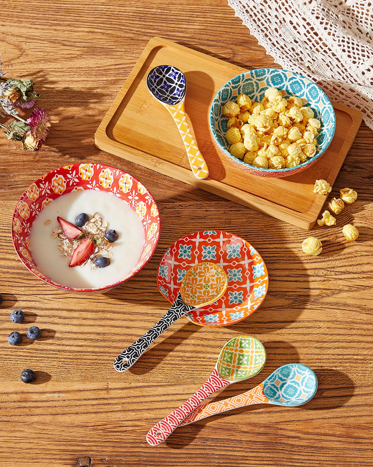 Metahom orange ceramic spoon for ice cream and small desserts.