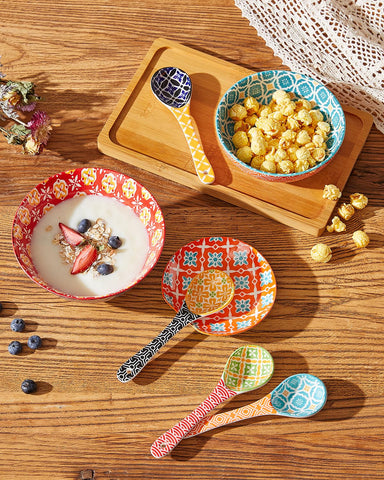 Metahom orange ceramic spoon for ice cream and small desserts.