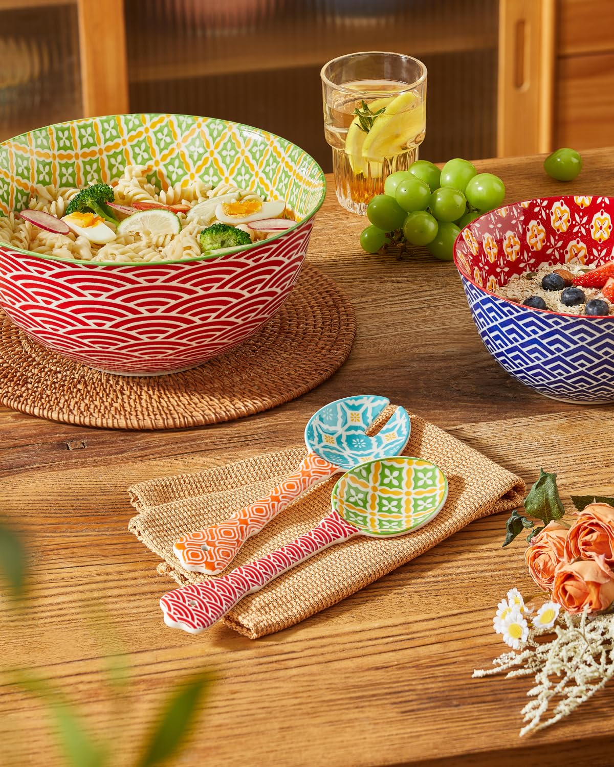Metahom ceramic salad spoon in orange with red fork for stylish plating.