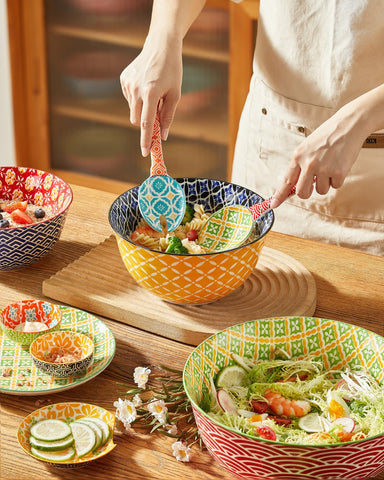 Metahom orange and red salad tongs are dishwasher-safe and durable.