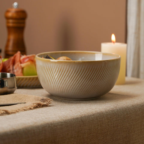 Metflavor Sculpted Dune table setting presented in warm beige tones.
