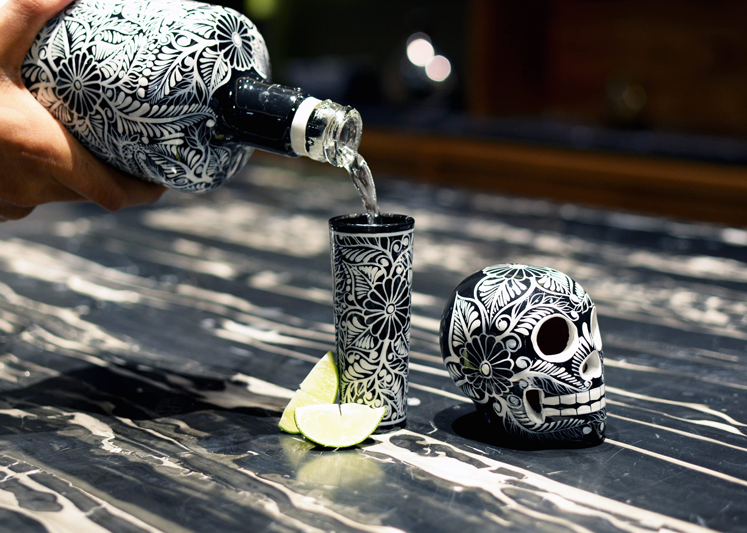 Hand-painted design detail from the Mexskeletons skull bottle