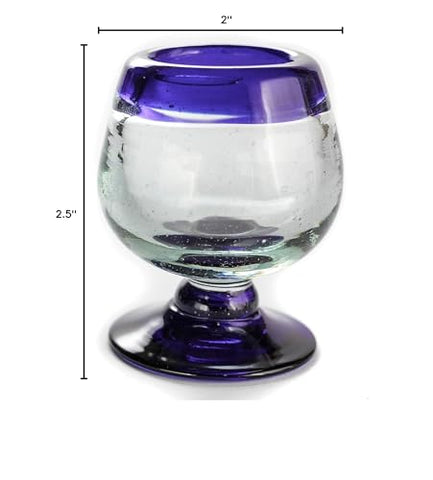 Vibrant cobalt rim on MEXTEQUIL shot glasses enhances tequila rituals