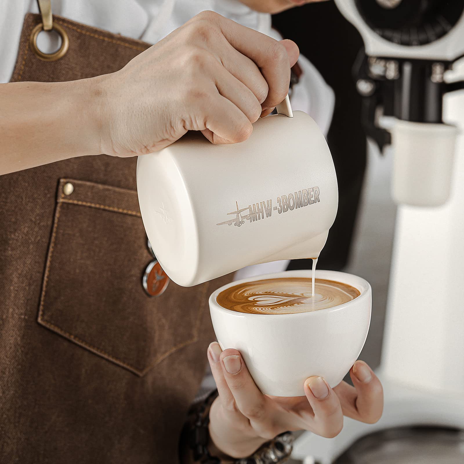 Double-diversion trench guides milk for cleaner latte art patterns.