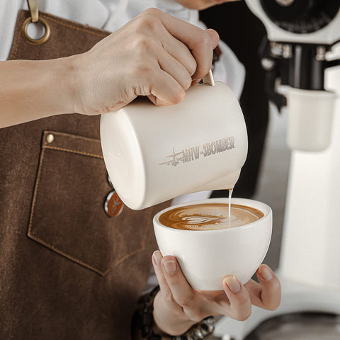Double-diversion trench guides milk for cleaner latte art patterns.