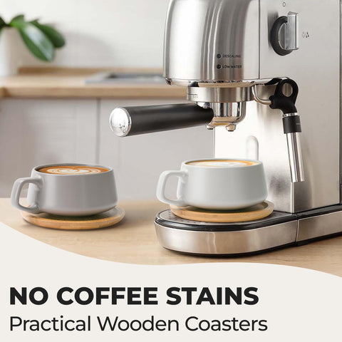 Close-up of MIAMIO wooden saucer detail with cup glaze.